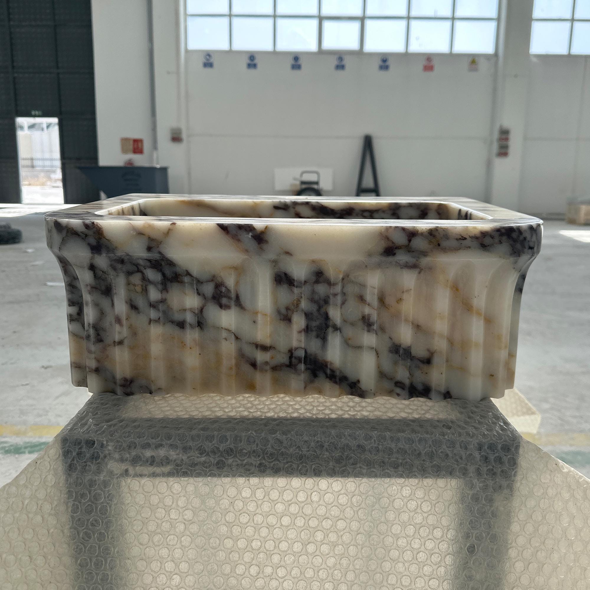 compact calacatta viola marble basin design