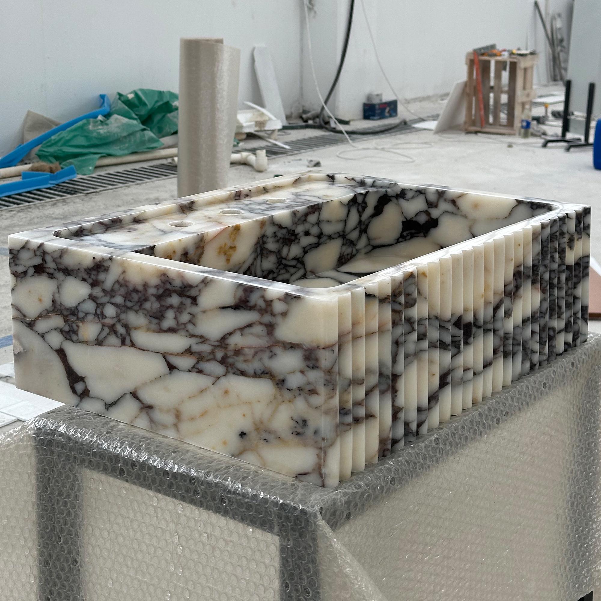 designer powder room calacatta viola basin