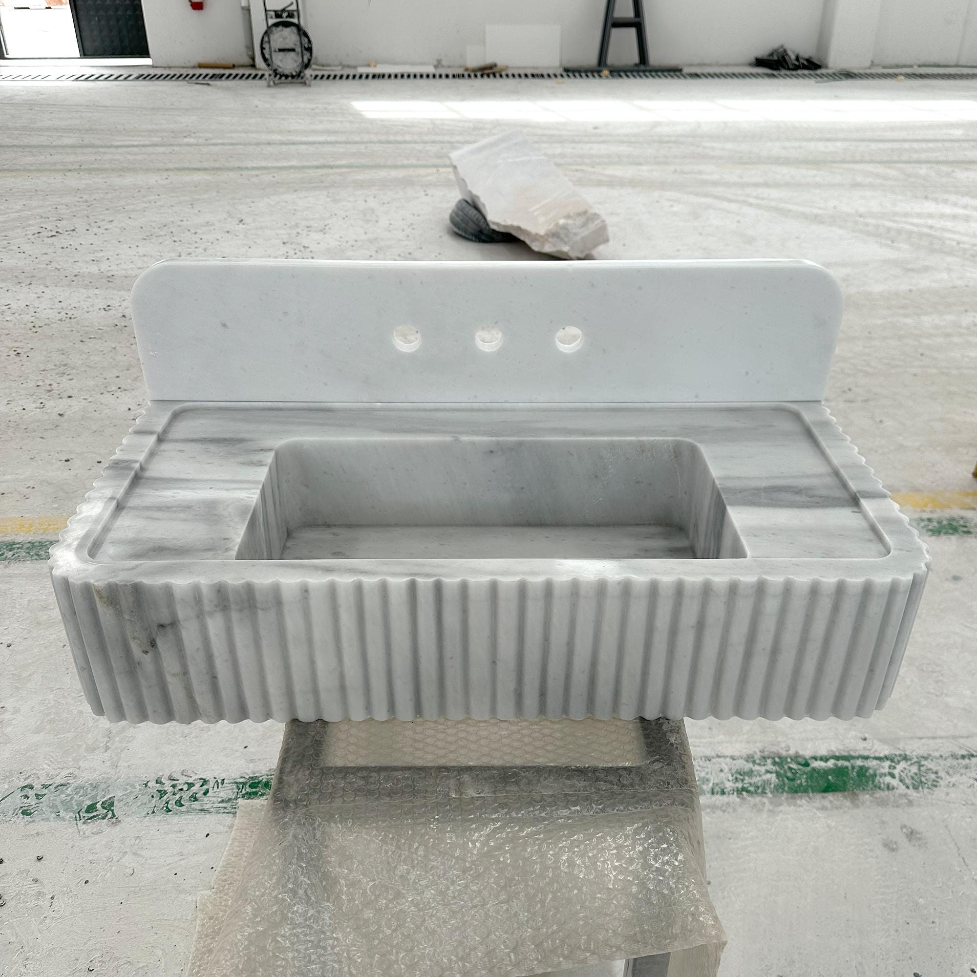 elegant carrara marble sink with backsplash