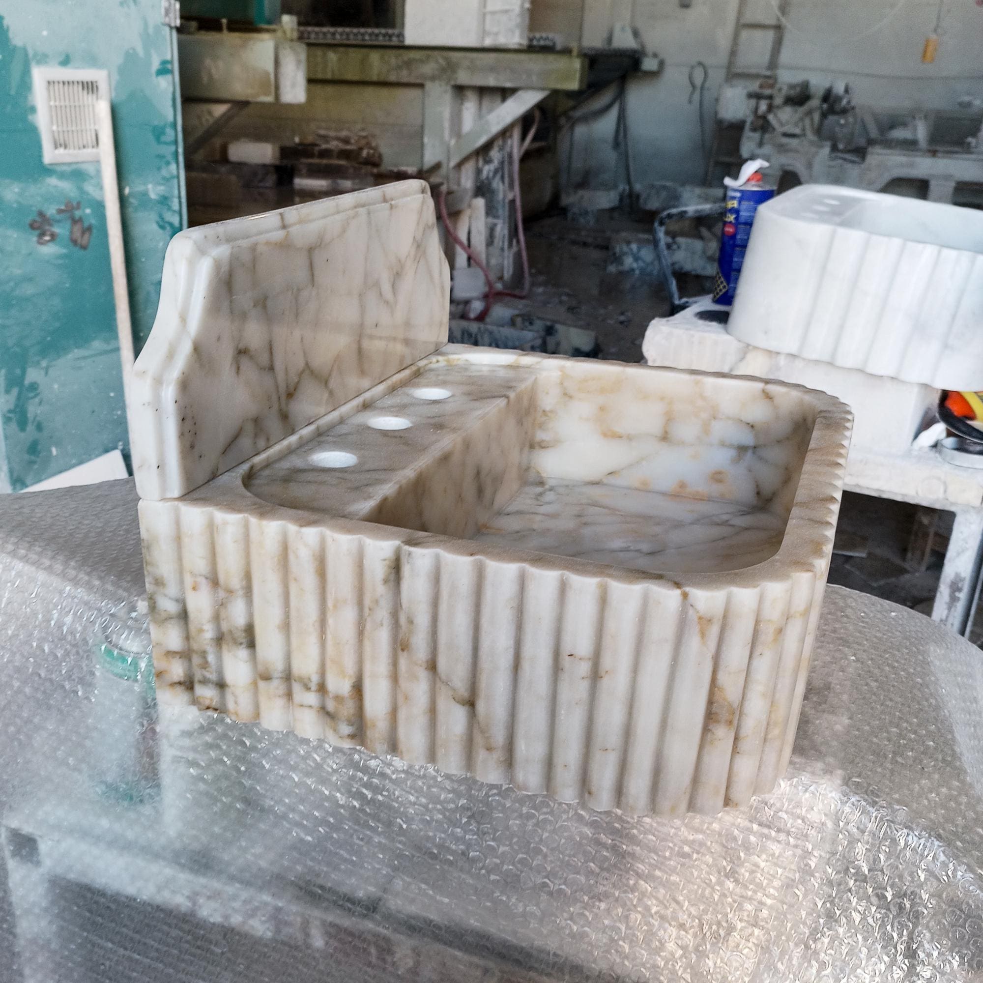 marble sink with backsplash