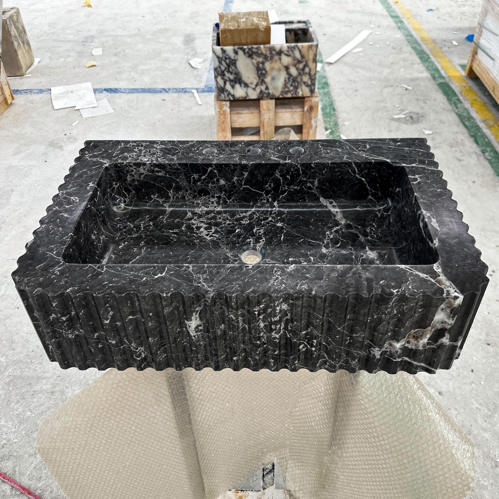 modern fluted black marble basin