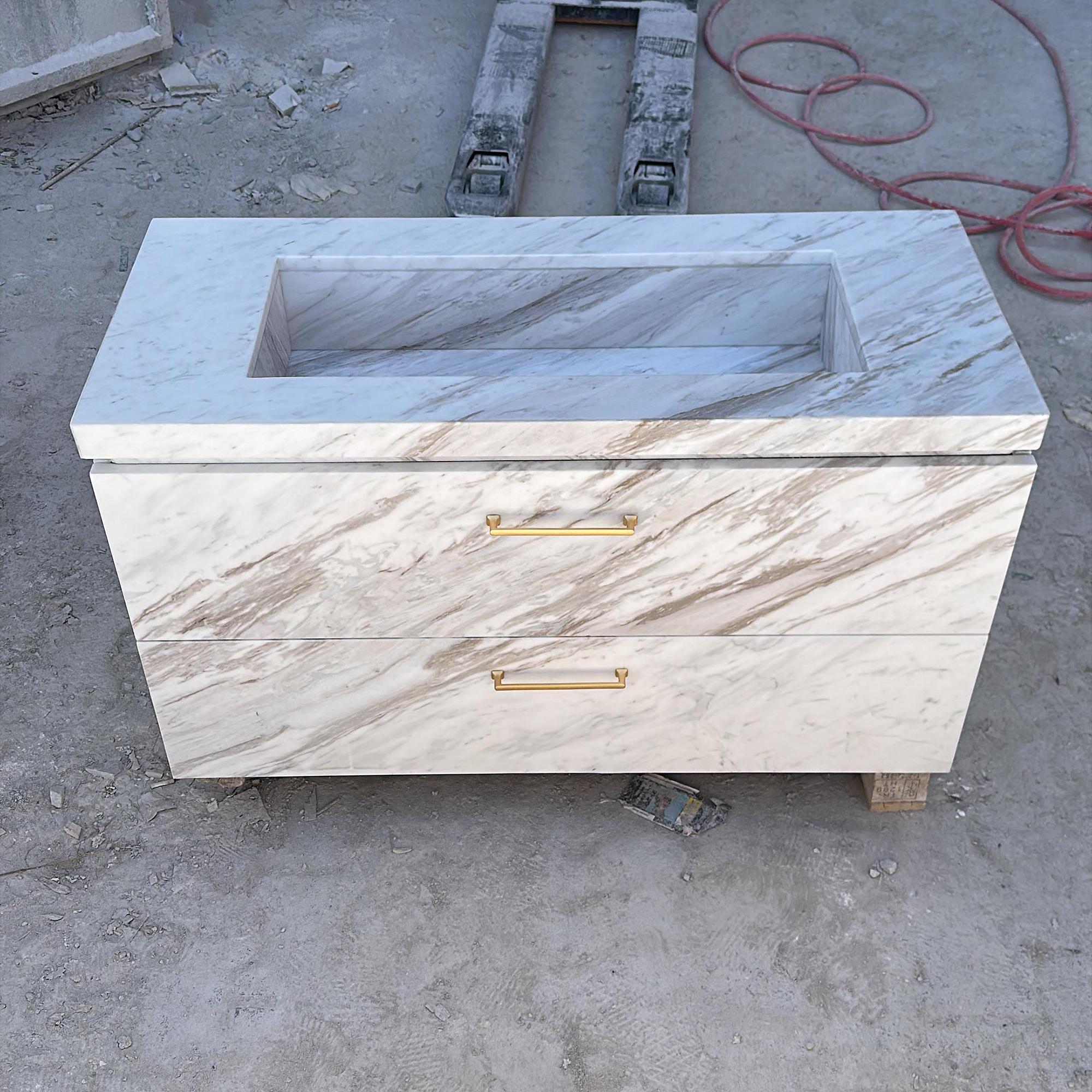 sleek marble vanity unit with gold handles